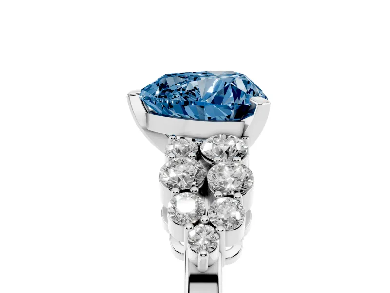 Fancy Blue Heart Cut Diamond Cluster Engagement Ring Set in Platinum with Pavé Band and Prong Setting