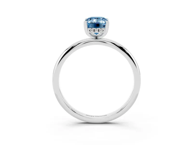 Fancy Blue Emerald Cut Diamond Solitaire Engagement Ring Set in Silver with Prong Setting and Polished Band