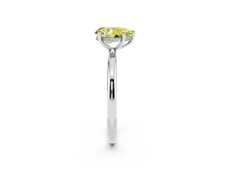 Fancy Yellow Pear Cut Diamond Solitaire Ring Set in White gold with Thin Band and Prong Setting