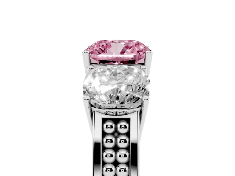 Fancy Pink Cushion Cut Diamond Three-Stone Ring Set in Platinum with Textured Band