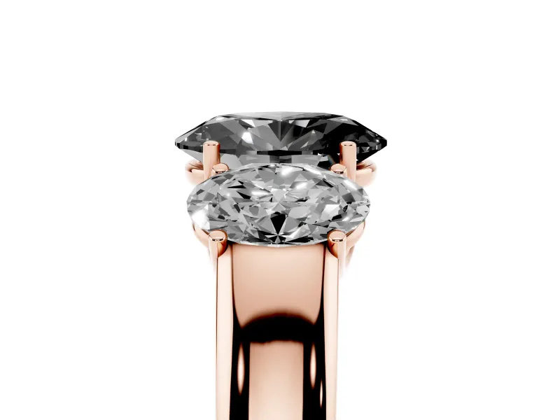 Fancy Black Three-Stone Oval Cut Diamond Ring Set in Rose gold with Matching Prong Settings and Plain Band