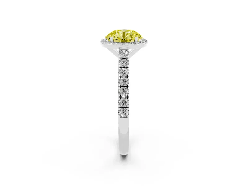 Fancy Yellow Round Cut Diamond Halo Engagement Ring Set in White gold with Pavé Band and Prong Setting