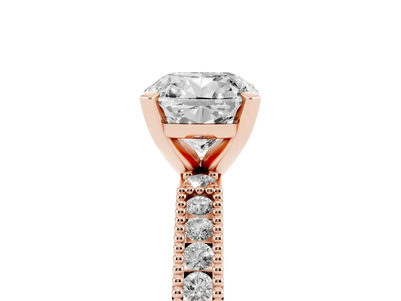 Cushion Cut Diamond Solitaire Ring Set in Rose gold with Slim Pavé Band and Prong Setting