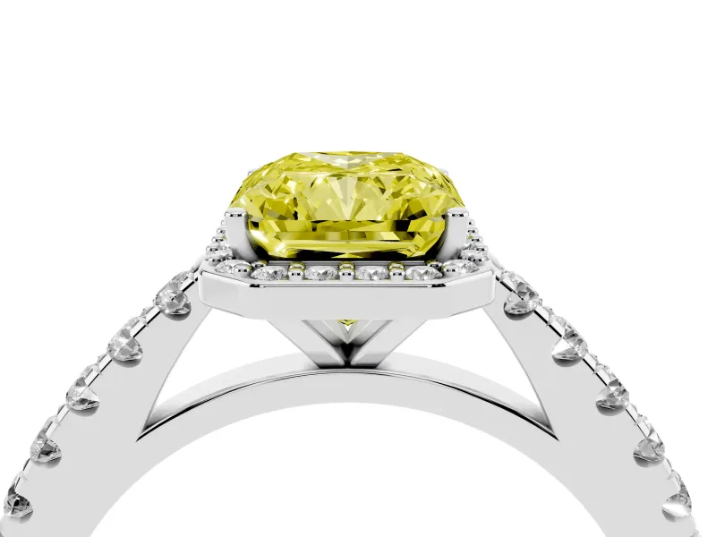 Fancy Yellow Radiant Cut Diamond Halo Engagement Ring Set in White gold with Pavé Band and Prong Setting