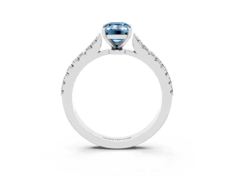 Fancy Blue Emerald Cut Diamond Solitaire Engagement Ring Set in Silver with Delicate Pavé Band and Prong Setting