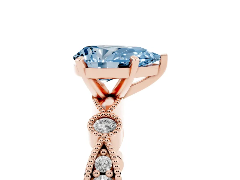 Fancy Blue Pear Cut Diamond Solitaire Engagement Ring Set in Rose gold with Milgrain Bezel Accent Band