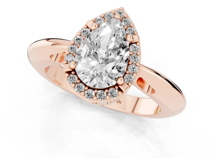 Pear Cut Diamond Halo Engagement Ring Set in Rose gold with Plain Split Shank and Prong Setting