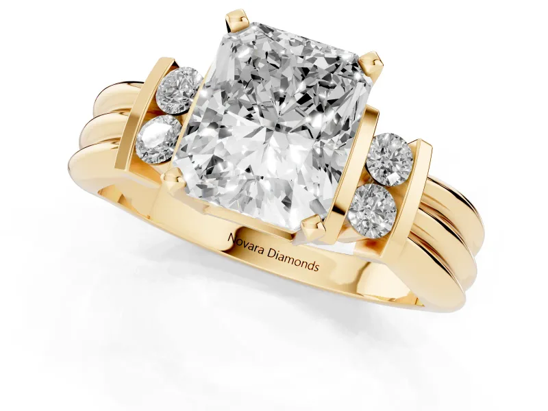 Three-Stone Radiant Cut Diamond Channel Set Ring Set in Yellow gold with Bar Prongs