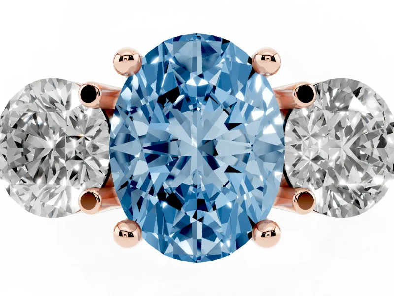 Fancy Blue Oval Cut Diamond Three-Stone Ring Set in Rose gold with Prong Setting and Classic Band