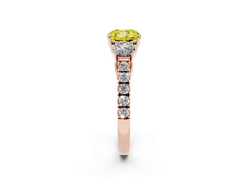 Fancy Yellow Cushion Cut Diamond Three-Stone Ring Set in Rose gold with Round Side Stones and Delicate Pavé Band