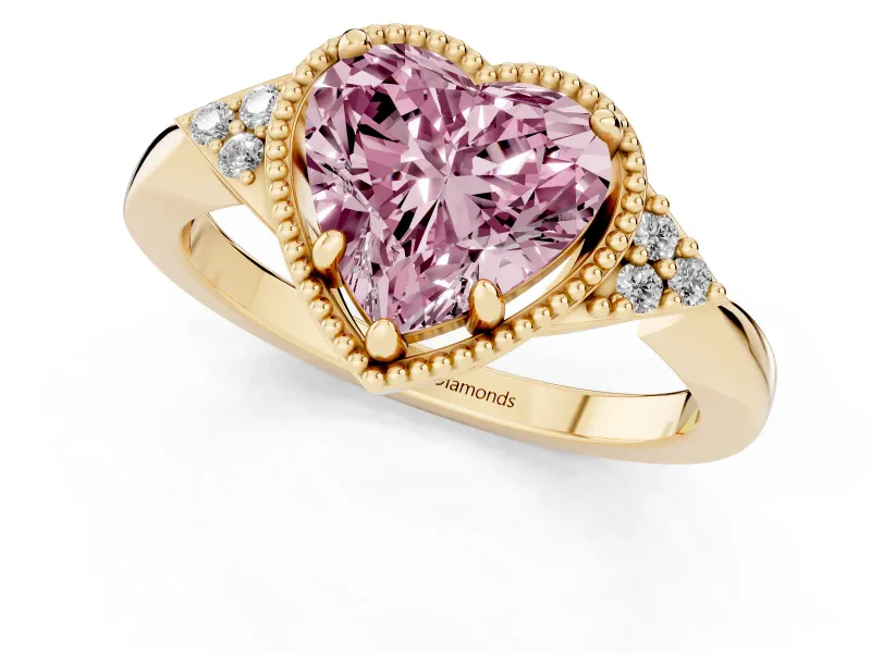 Fancy Pink Heart Cut Diamond Milgrain Solitaire Ring Set in Yellow gold with Tapered Pavé Band and Prong Setting