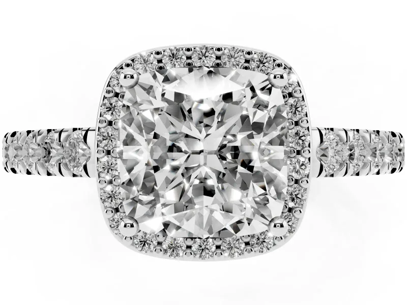 Cushion Cut Diamond Halo Engagement Ring Set in Silver with Pavé Band and Prong Setting