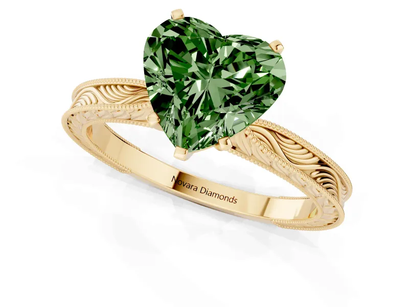 Fancy Green Heart Cut Diamond Solitaire Milgrain Engraved Band Set in Yellow gold with Prong Setting
