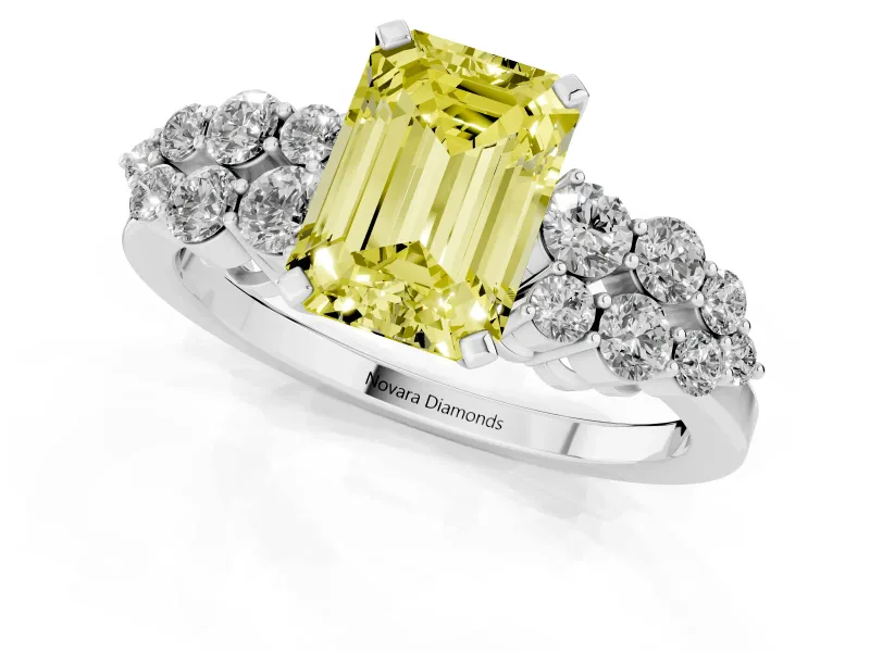 Fancy Yellow Emerald Cut Diamond Cluster Engagement Ring Set in Platinum with Pavé Band and Prong Setting