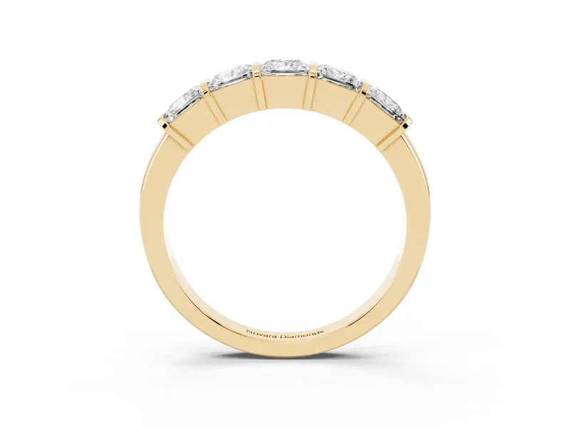 Princess Cut Diamond Seven-Stone Channel Band Set in Yellow gold with Bar Prongs