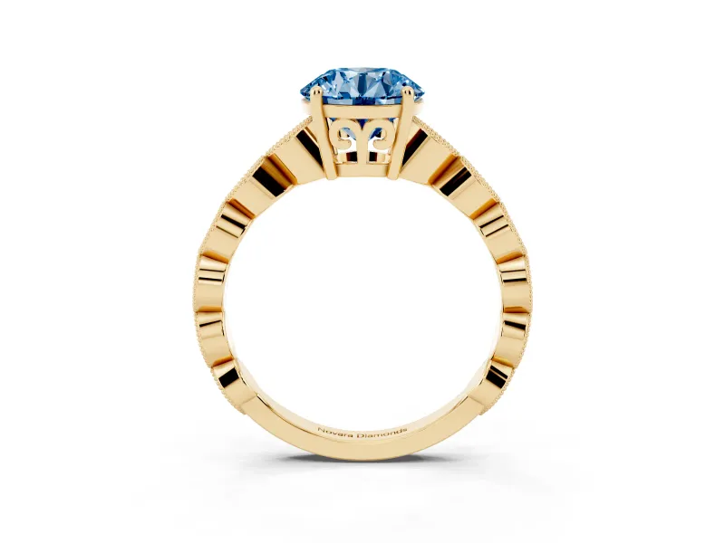 Fancy Blue Round Cut Diamond Solitaire Ring Set in Yellow gold with Infinity Twist Pavé Band