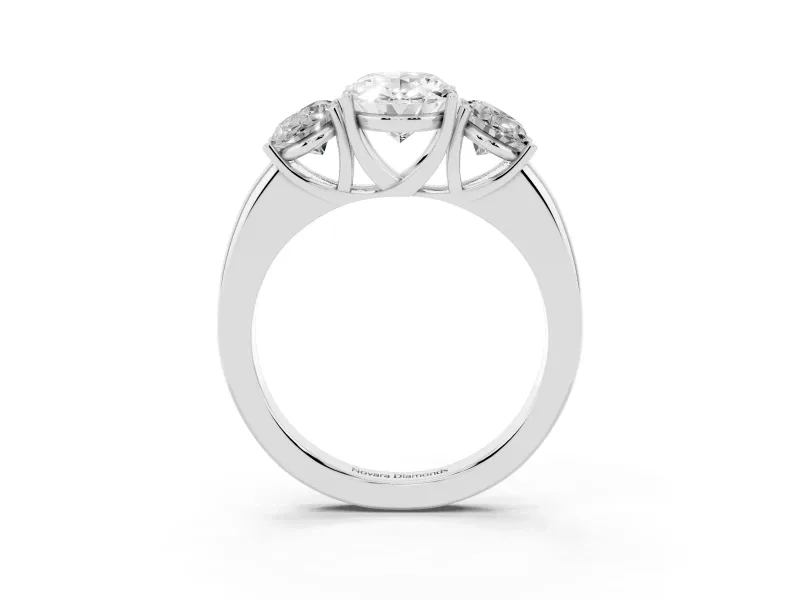 Oval Cut Diamond Three-Stone Ring Set in Platinum with Bold Center and Classic Band