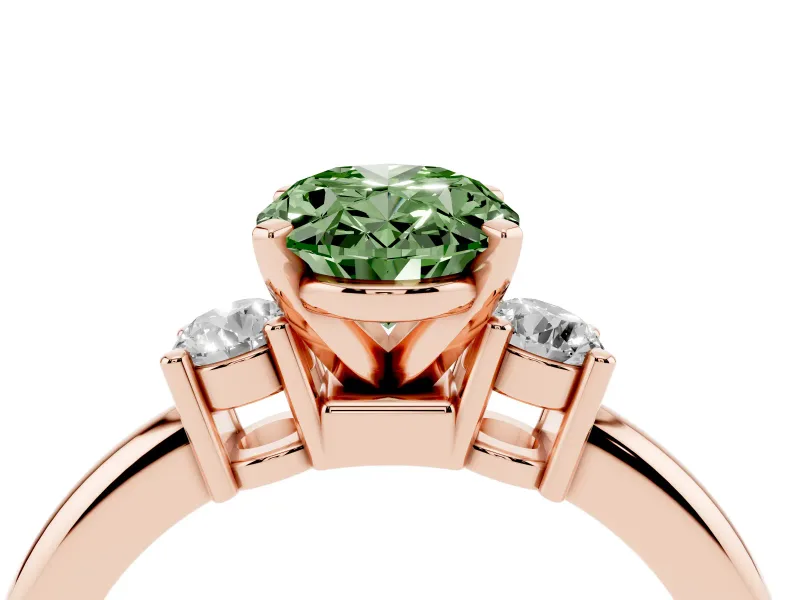 Fancy Green Three-Stone Oval Cut Diamond Ring Set in Rose gold with Prong Setting and Plain Band