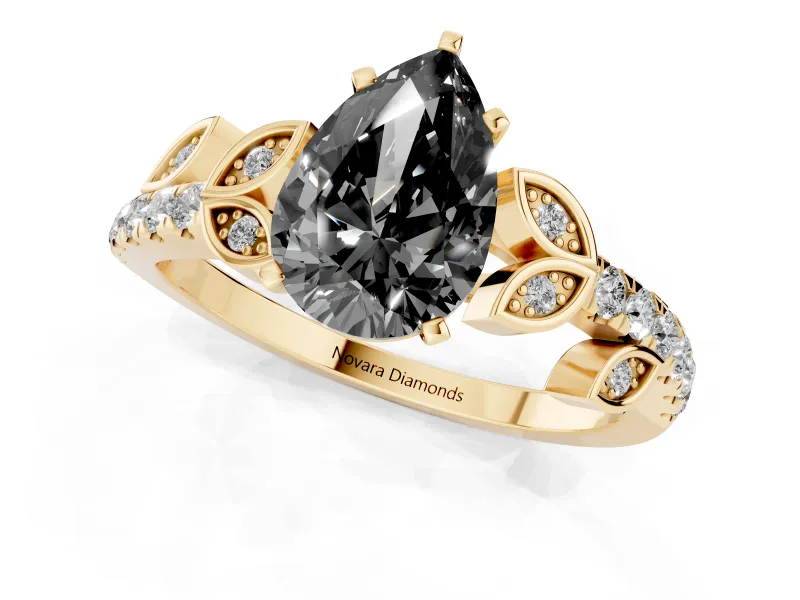 Fancy Black Pear Cut Diamond Solitaire Leaf-Inspired Ring Set in Yellow gold with Pavé Band and Prong Setting
