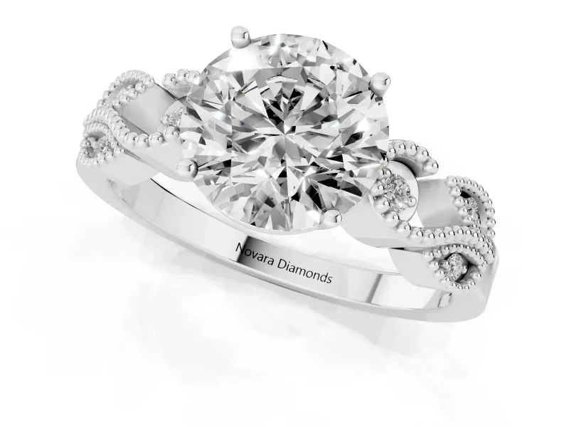 Round Cut Diamond Milgrain Leaf Band Solitaire Ring Set in White gold with Accent Stones and Prong Setting