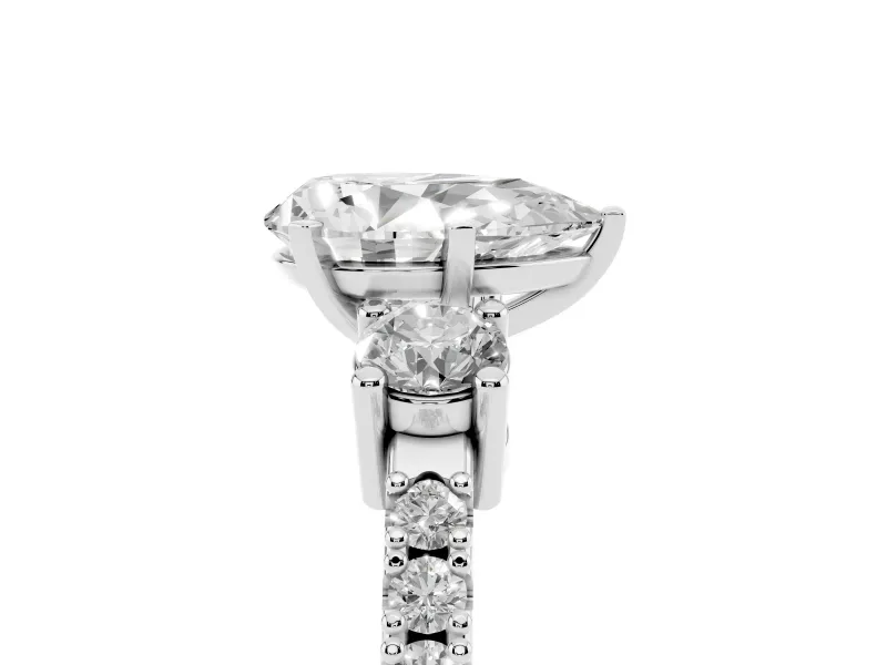 Pear-Shaped Three Stone Pavé Engagement Ring Setting | Round Side Stones | Platinum