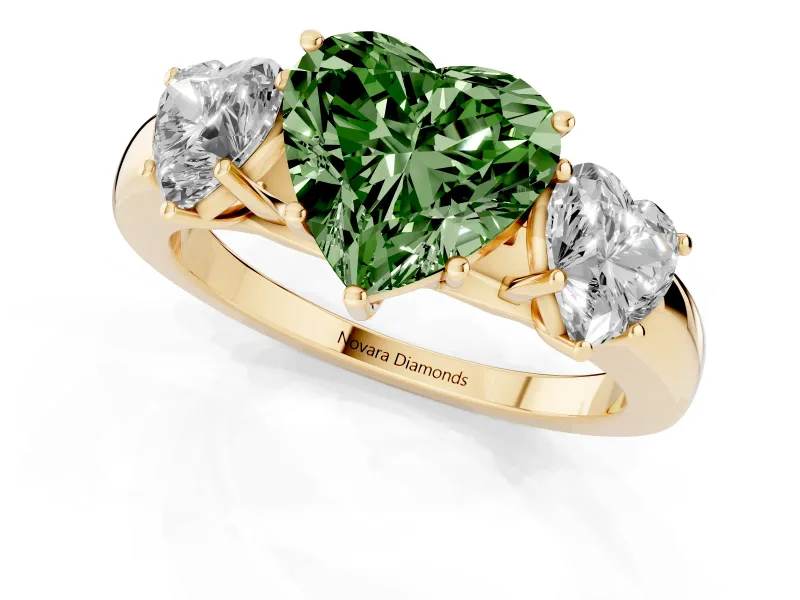 Fancy Green Heart Cut Diamond Three-Stone Ring Set in Yellow gold with Bold Center and Classic Band