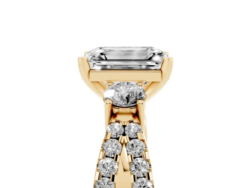 Emerald Cut Diamond Three-Stone Ring Set in Yellow gold with Pavé Split Shank and Prong Setting
