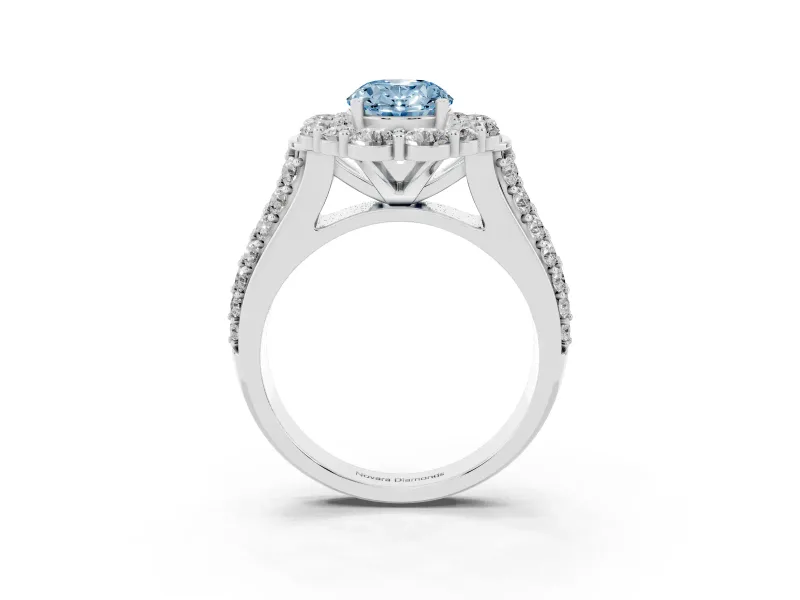 Fancy Blue Oval Cut Diamond Halo Engagement Ring Set in White gold with Split Shank and Prong Setting