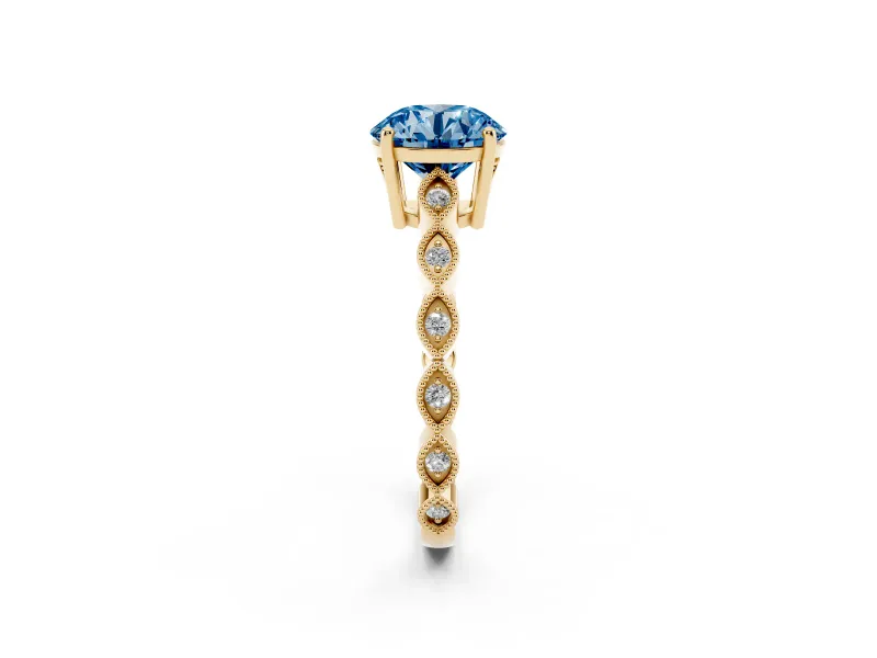 Fancy Blue Round Cut Diamond Solitaire Ring Set in Yellow gold with Infinity Twist Pavé Band