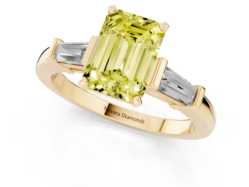 Fancy Yellow Emerald Cut Diamond Solitaire Ring Set in Yellow gold with Tapered Baguette Accents and Prong Setting