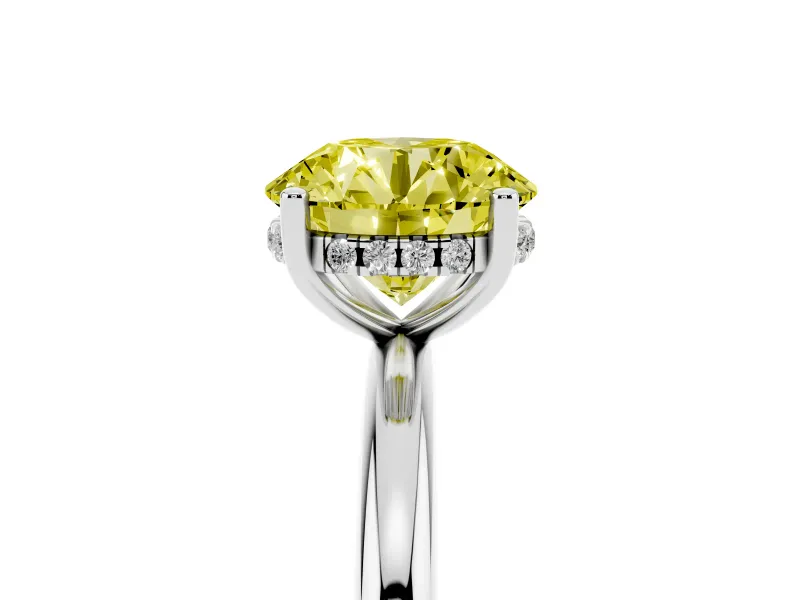 Fancy Yellow Round Cut Diamond Solitaire Engagement Ring Set in White gold with Prong Setting and Polished Band
