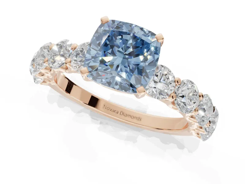 Cushion Cut Side Stone Engagement Ring Setting for a Fancy Blue Lab-Grown Diamond | Scalloped Prong Accents | Rose Gold