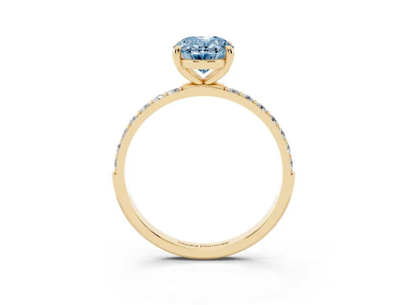 Fancy Blue Oval Cut Diamond Solitaire Ring Set in Yellow gold with Round Pavé Band and Prong Setting