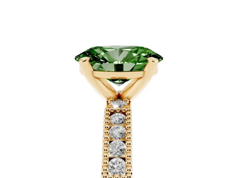 Fancy Green Oval Cut Diamond Solitaire Ring Set in Yellow gold with Slim Pavé Band and Prong Setting