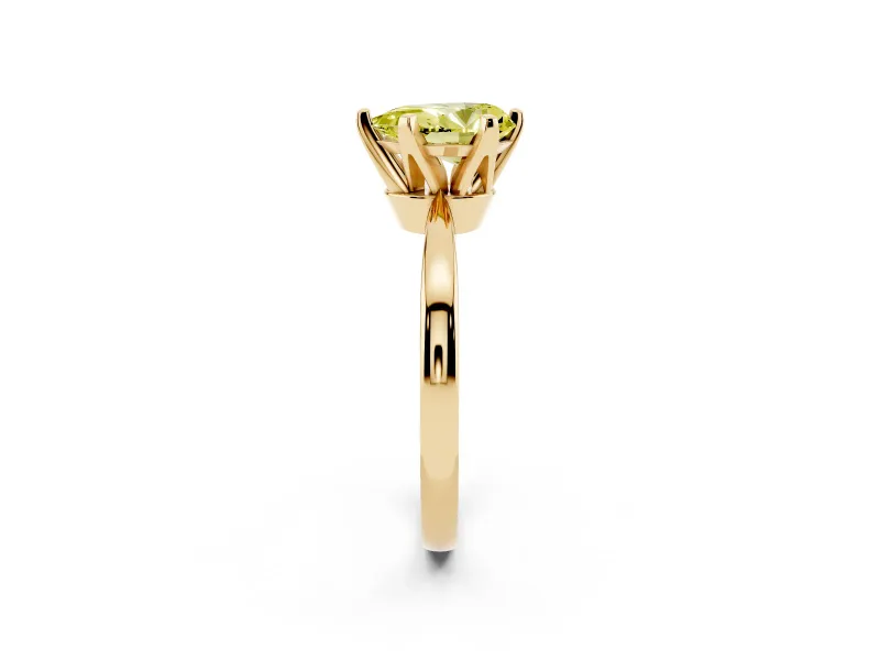 Fancy Yellow Pear Cut Diamond Solitaire Engagement Ring Set in Yellow gold with Slim Tapered Solitaire Band