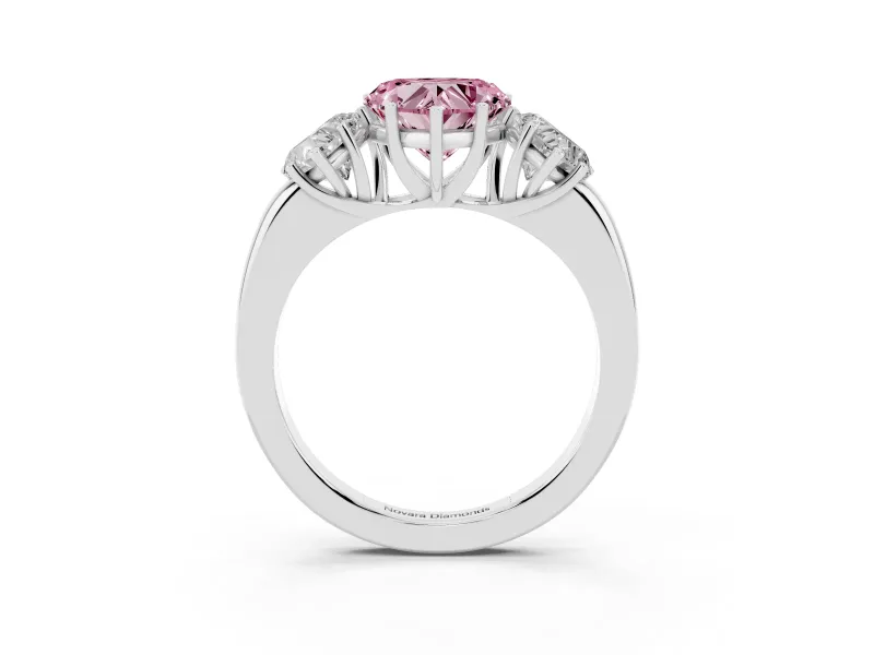 Fancy Pink Heart Cut Diamond Three-Stone Ring Set in White gold with Bold Center and Classic Band