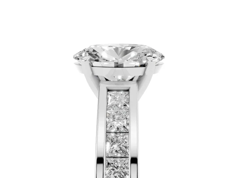 Oval Cut Diamond Solitaire Ring Set in Platinum with Channel-Set Band and Prong Setting