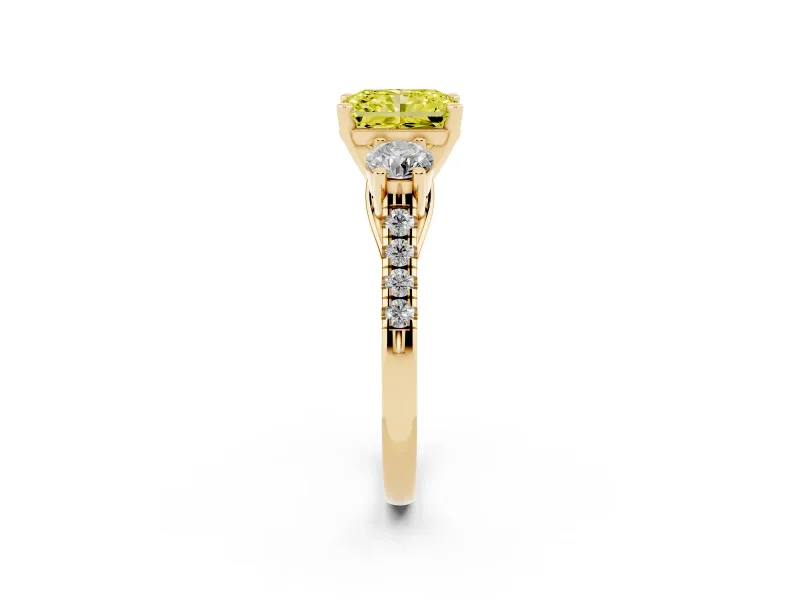 Fancy Yellow Three-Stone Radiant Cut Diamond Pavé Band Ring Set in Yellow gold with Prong-Set Trio