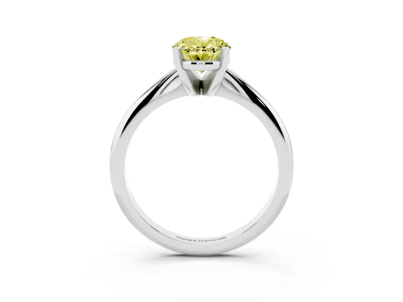 Fancy Yellow Oval Cut Diamond Solitaire Ring Set in Silver with Prong Setting on a Plain Round Band
