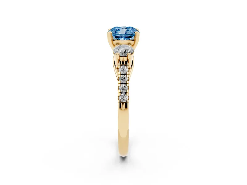 Fancy Blue Three-Stone Cushion Cut Diamond Pavé Band Ring Set in Yellow gold with Prong-Set Trio
