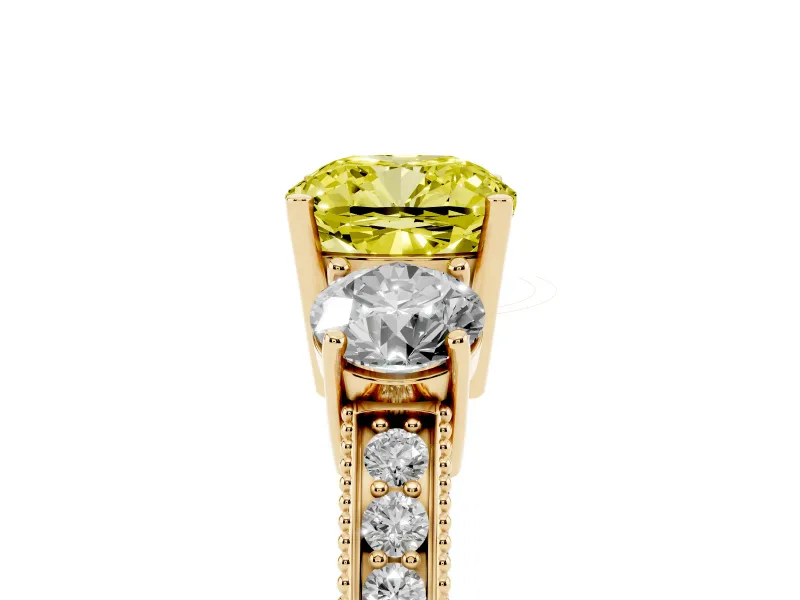 Fancy Yellow Cushion Cut Diamond Three-Stone Ring Set in Yellow gold with Round Side Stones and Pavé Band