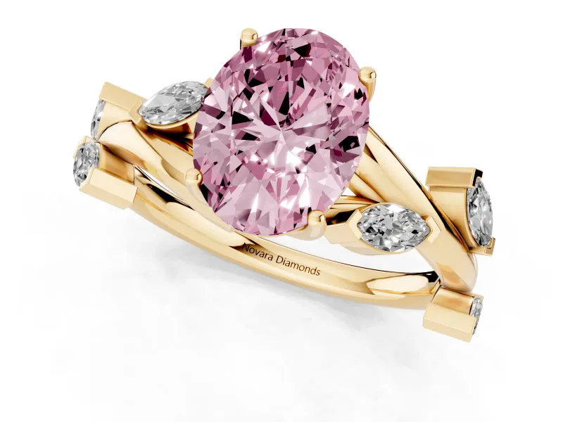 Fancy Pink Oval Cut Diamond Solitaire Ring Set in Yellow gold with Twisted Marquise Accent Band