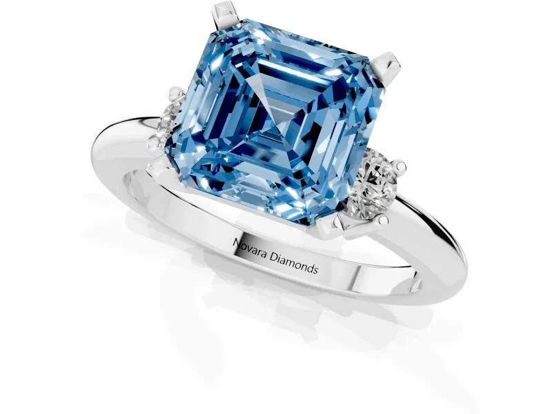 Fancy Blue Three-Stone Asscher Cut Diamond Ring Set in Silver with Prong Setting and Plain Band