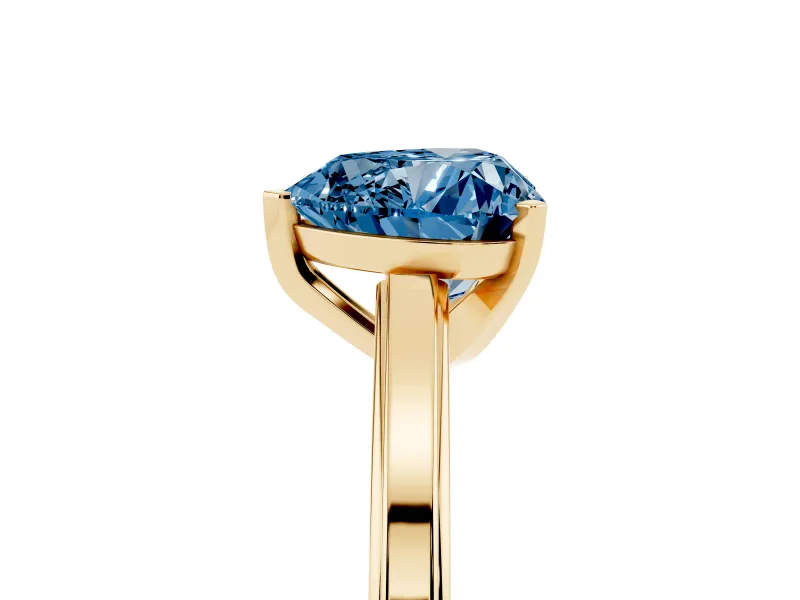 Fancy Blue Heart Cut Diamond Solitaire Ring Set in Yellow gold with Prong Setting and Classic Band