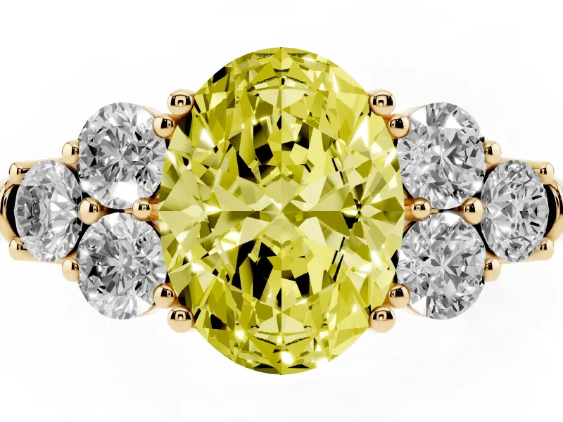 Fancy Yellow Oval Cut Diamond Cluster Ring Set in Yellow gold with Round Accent Stones and Prong Setting on a Plain Band