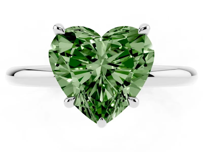 Fancy Green Heart Cut Diamond Solitaire Ring Set in Silver with Thin Band and Prong Setting