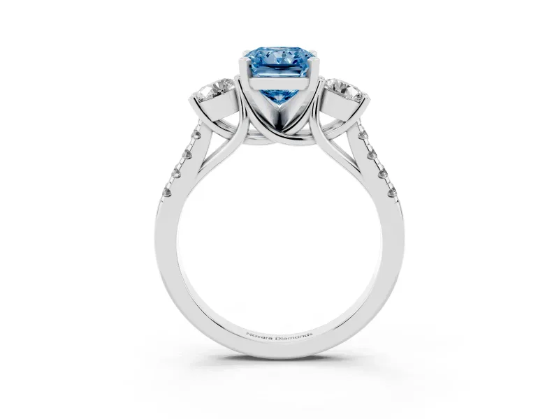Fancy Blue Three-Stone Radiant Cut Diamond Pavé Band Ring Set in Platinum with Prong-Set Trio