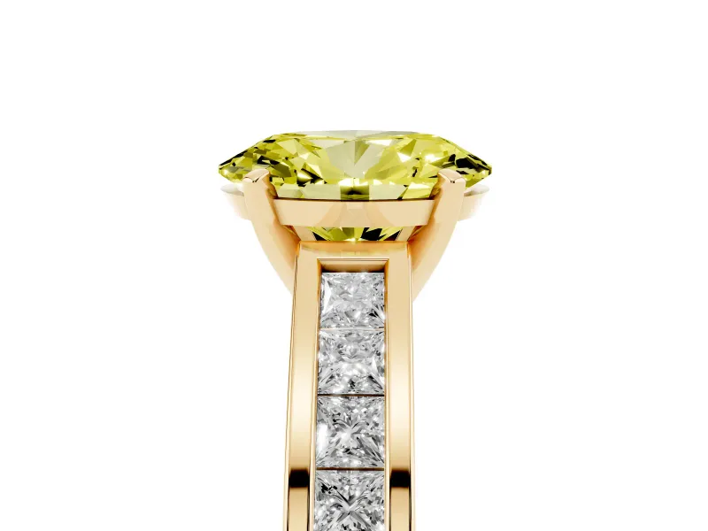 Fancy Yellow Oval Cut Diamond Solitaire Ring Set in Yellow gold with Channel-Set Band and Prong Setting