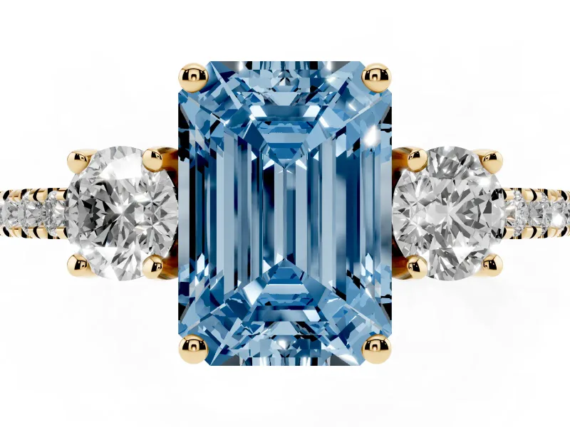 Emerald Cut Three Stone Engagement Ring Setting for a Fancy Blue Lab-Grown Diamond | Pave Shoulders | Yellow Gold