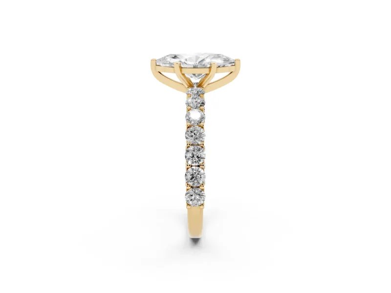 Marquise Cut Diamond Solitaire Ring Set in Yellow gold with Shared Prong Pavé Band